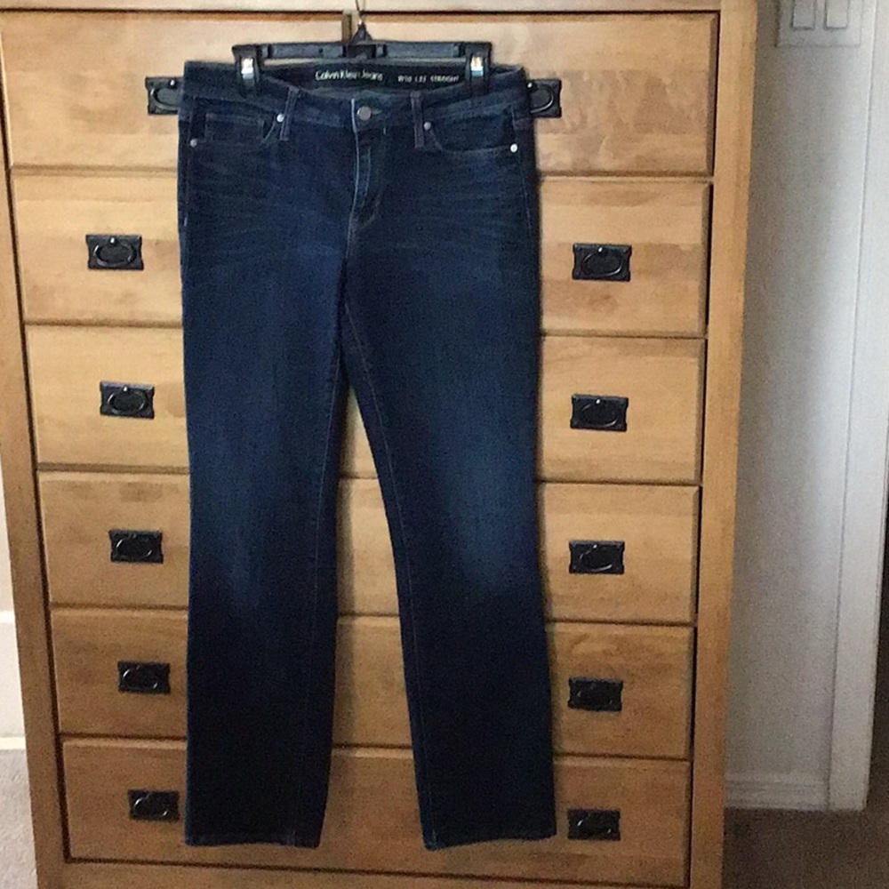 Calvin Klein dark denim jeans.